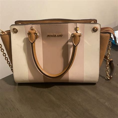 michael kors changeable purse|Michael Kors price adjustment.